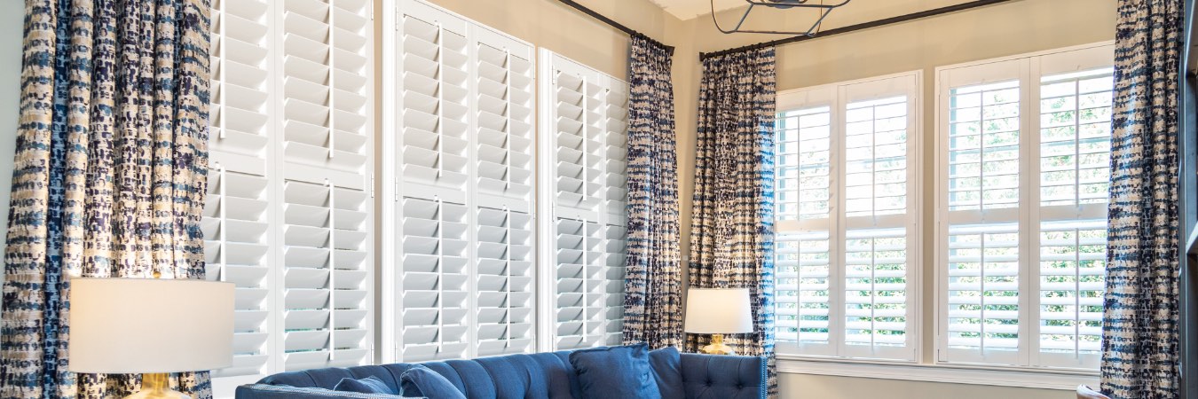 Interior shutters in Brookline family room