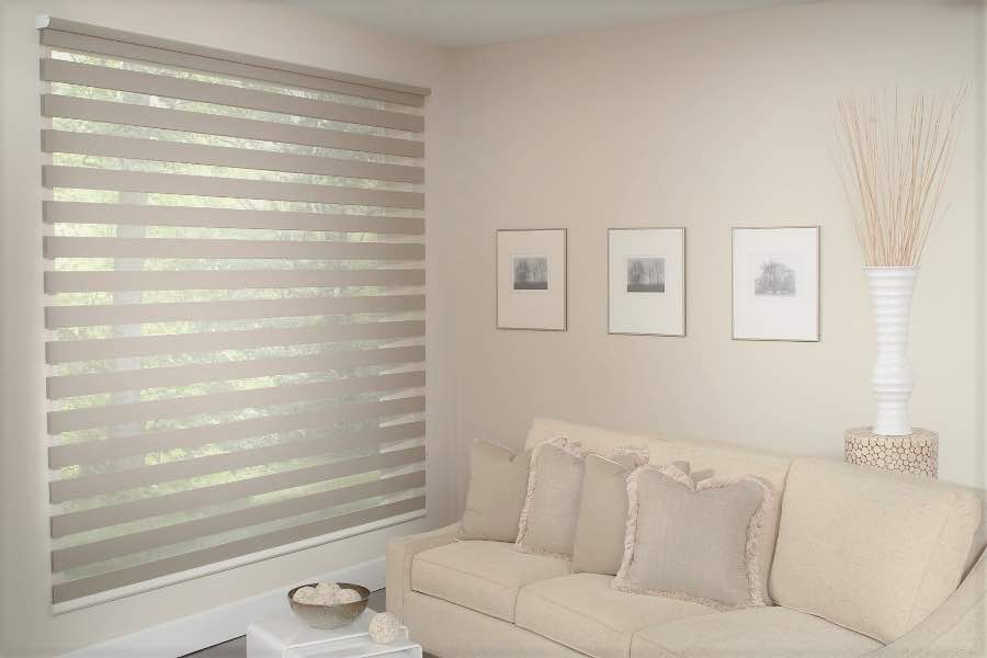 Zebra shades give you a unique combination of light control and style that benefits your Boston home. Zebra shade allows filtered light into a living room
