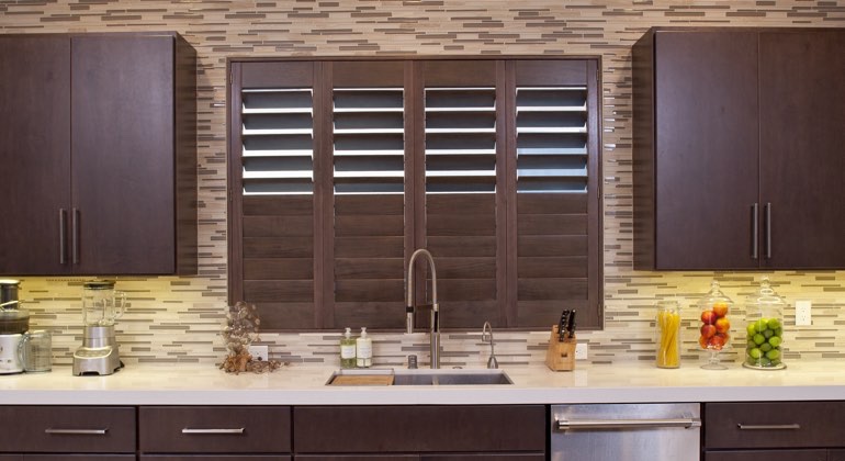 Divider rail shutters in a Boston kitchen. Boston cafe kitchen shutters