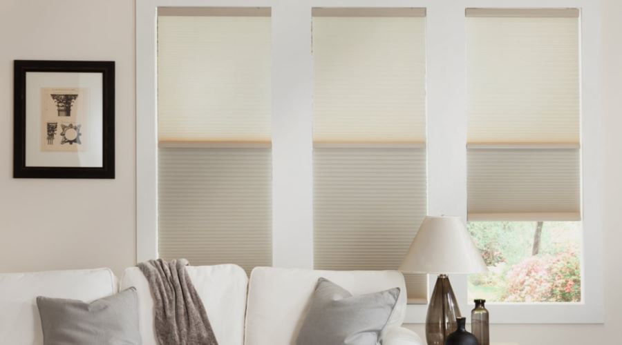 Cellular shades are energy efficient and stop air from entering through your window. Cellular shades in a Boston living room