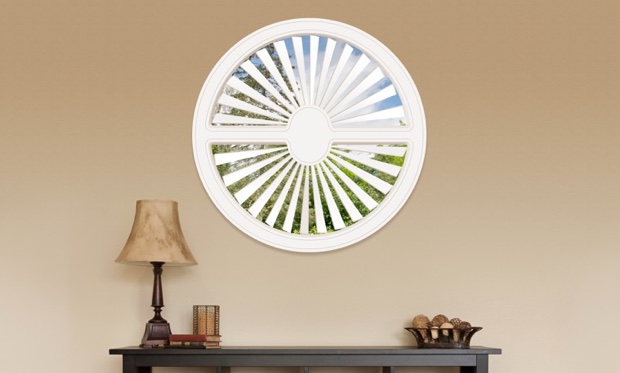 You can cover specialty shaped windows with our Polywood shutters. Circle shaped window in Boston