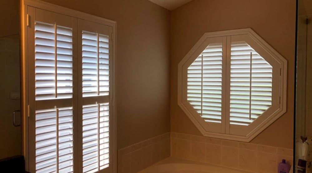 Octagon window treatments Octagon window in a Boston bathroom