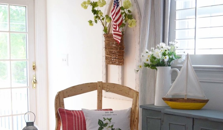 Bright sitting corner with faux wood plantation shutters in Boston. Faux wood plantation shutters in Boston