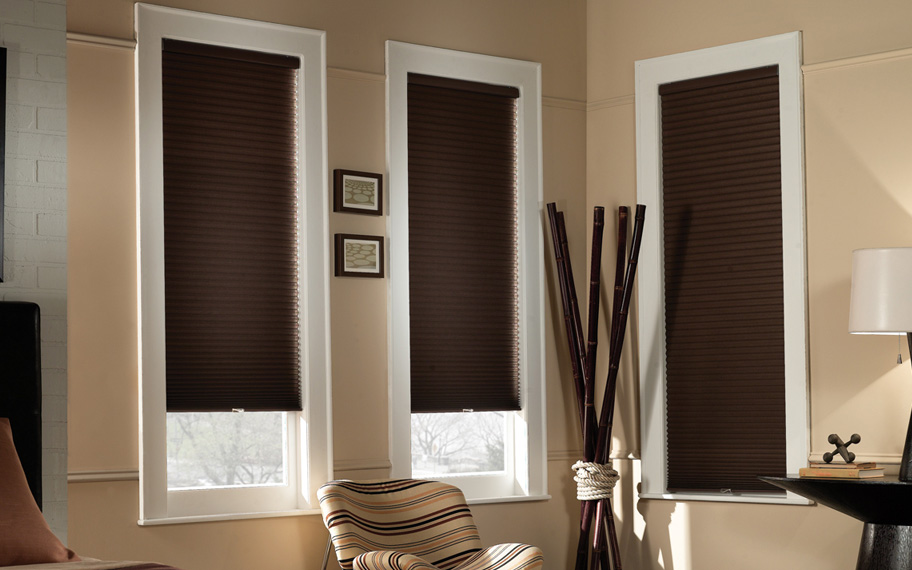 Motorized window shades make opening and closing your shades more convenient. Motorized window shades within the bedroom windows. Espresso color.