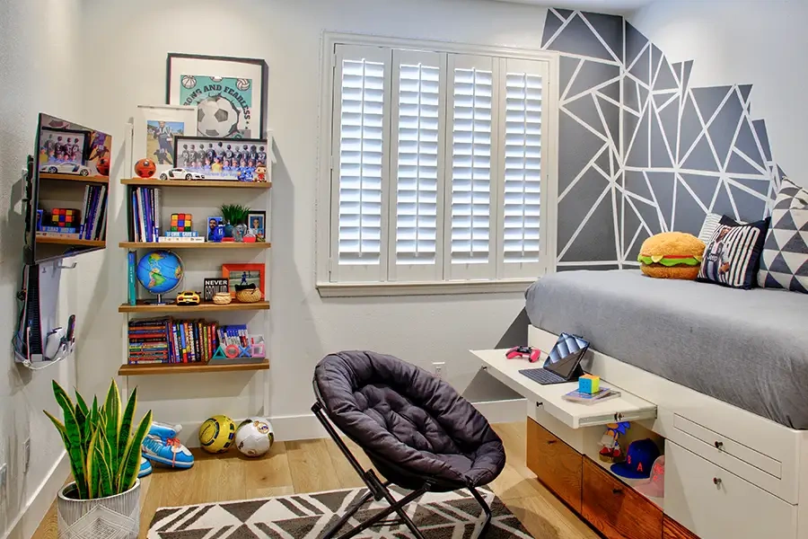 White Polywood shutters in a child's playroom.